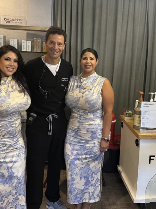 Dr. Patt in scrubs with members of the ACPS Med Spa team