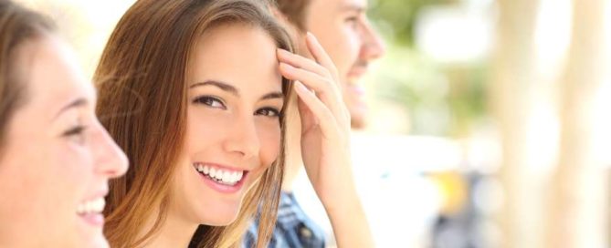 Beauty woman with white smile with friends