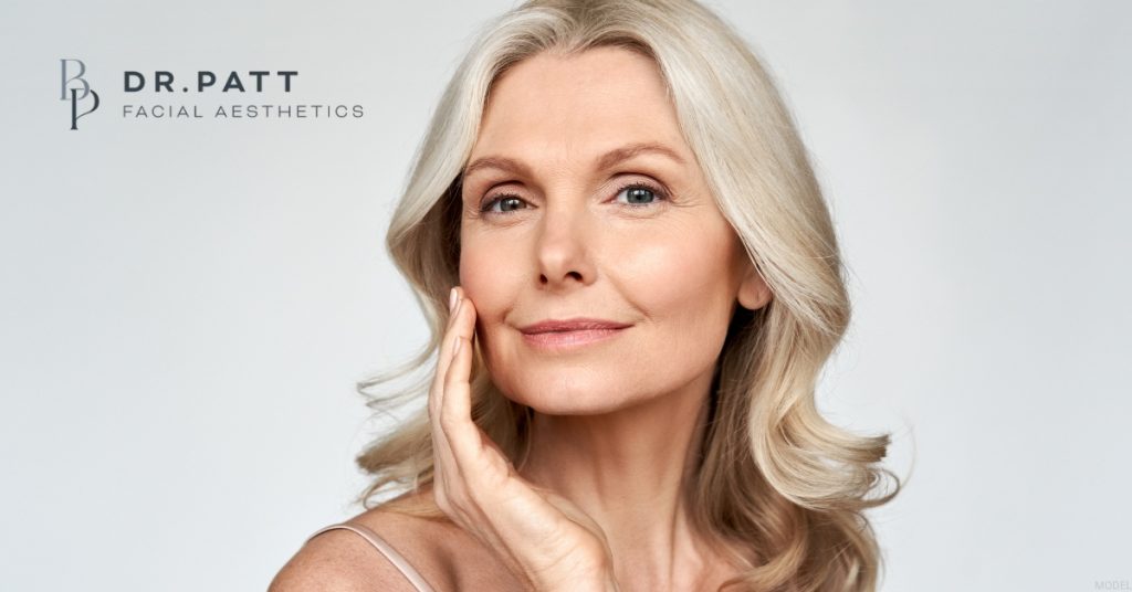 Mature woman after facial plastic surgery. (Model)