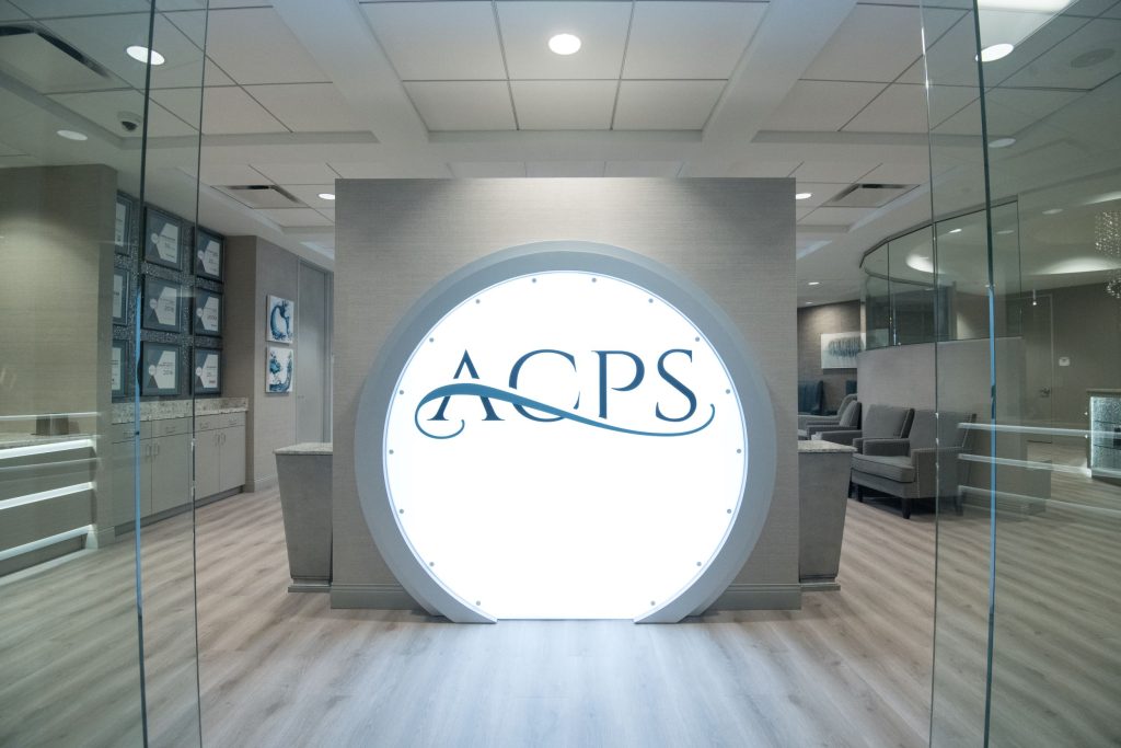 Post Oak front entrance with a big ACPS light